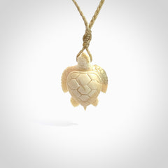 This is a beautiful hand carved woolly mammoth tusk turtle pendant. A really cool piece that is made from this rare and beautiful material. The mammoth has a very distinctive grain and each piece is different. We ship this worldwide and the cost of shipping is included in the price.