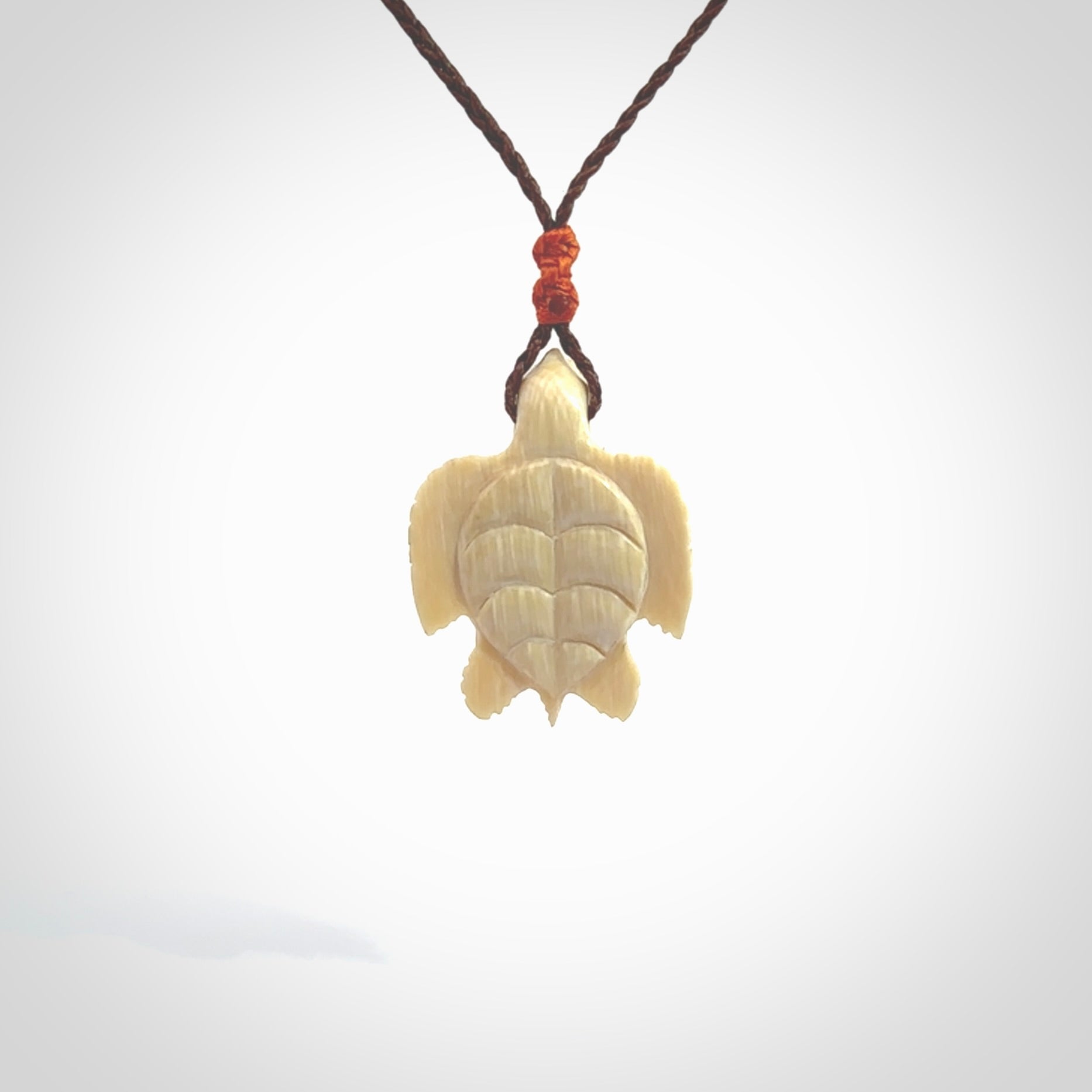 This is a beautiful hand carved woolly mammoth tusk turtle pendant. A really cool piece that is made from this rare and beautiful material. The mammoth has a very distinctive grain and each piece is different. We ship this worldwide and the cost of shipping is included in the price.