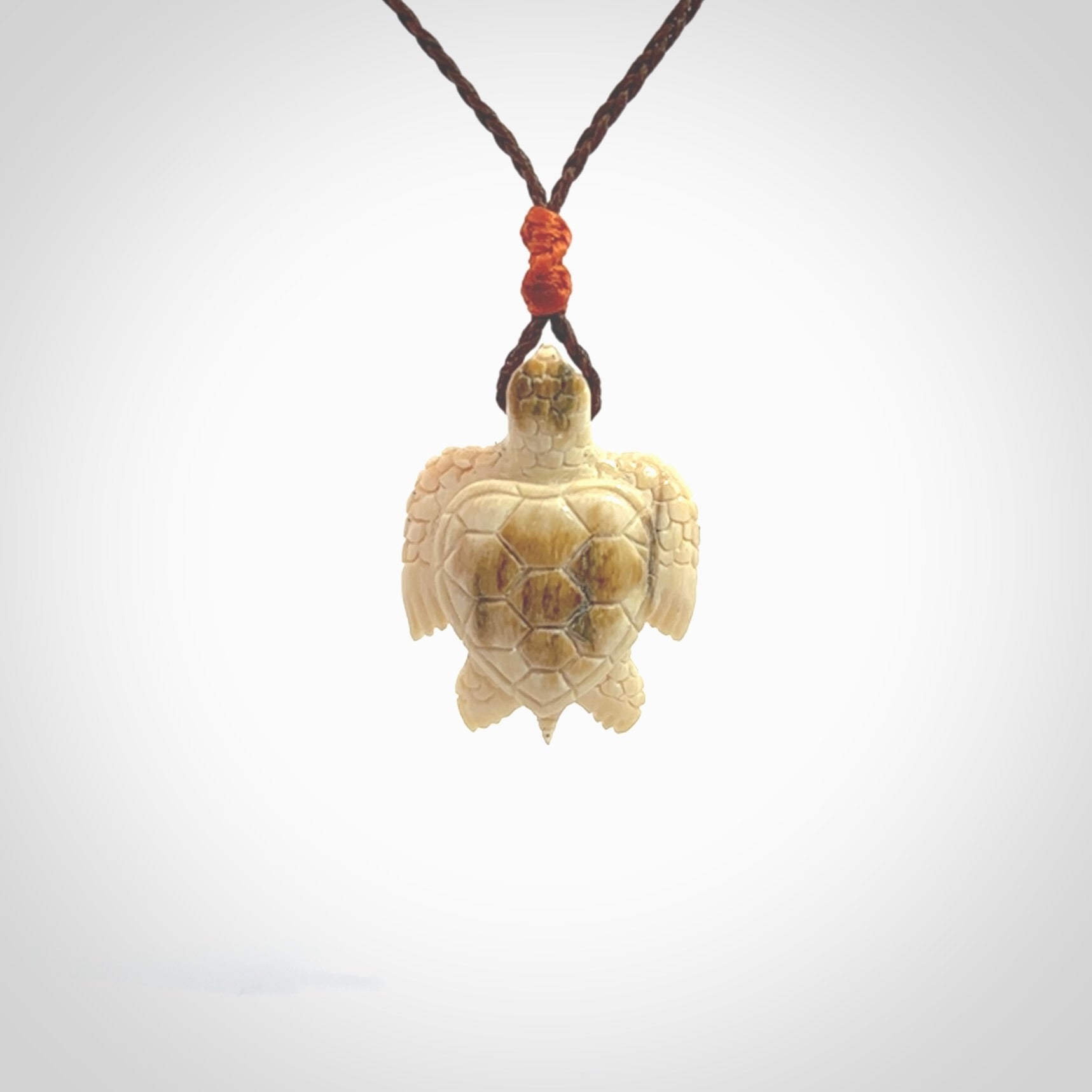 This is a beautiful hand carved woolly mammoth tusk turtle pendant. A really cool piece that is made from this rare and beautiful material. The mammoth has a very distinctive grain and each piece is different. We ship this worldwide and the cost of shipping is included in the price.