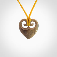 Hand carved heart pendant. Hand made from woolly mammoth tusk. Hand made jewellery for sale online. Rare and unique handmade jewellery. Made by NZ Pacific.