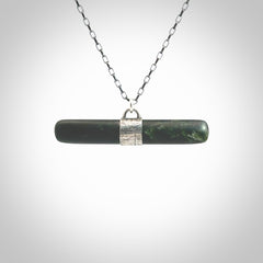 This is a beautiful green fob style drop design pendant that we has been carved here in New Zealand by Josey Coyle. It is carved from a piece of New Zealand Marsden Jade pounamu with Sterling Silver fittings and a sterling silver chain. A contemporary drop shaped pendant made to wear.