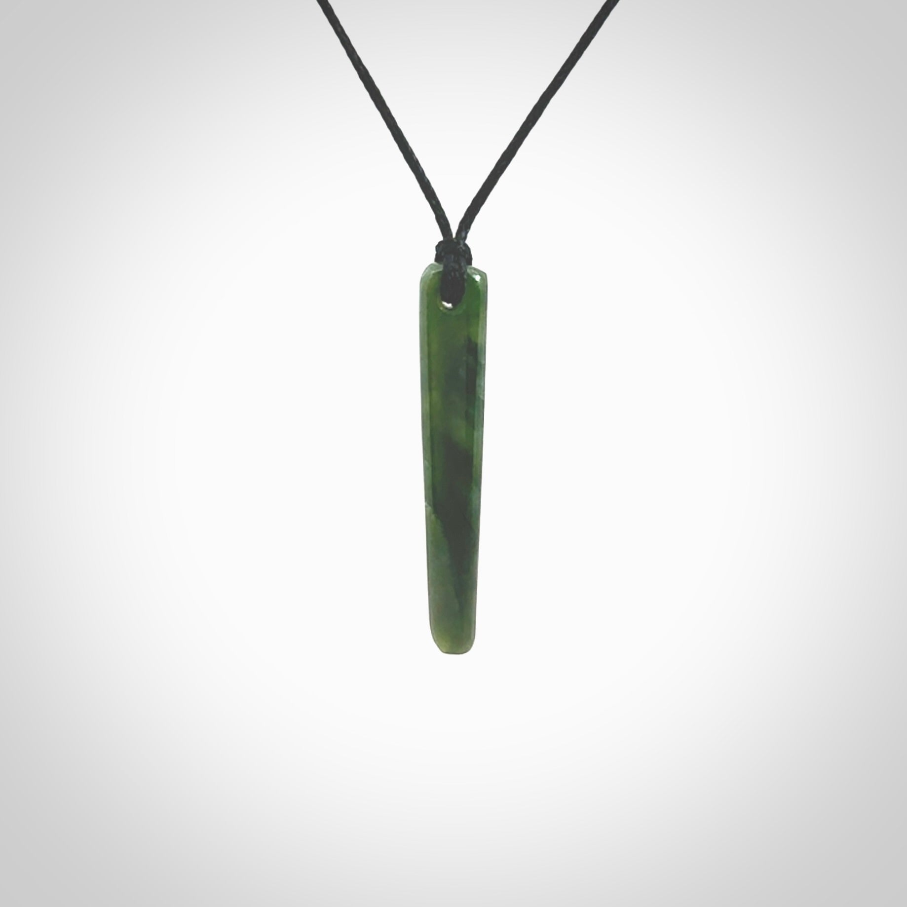 Hand carved pounamu drop pendant. Jade necklace hand made in New Zealand. A simple drop pendant carved from rare New Zealand jade. NZ Pacific jade jewellery for sale online.