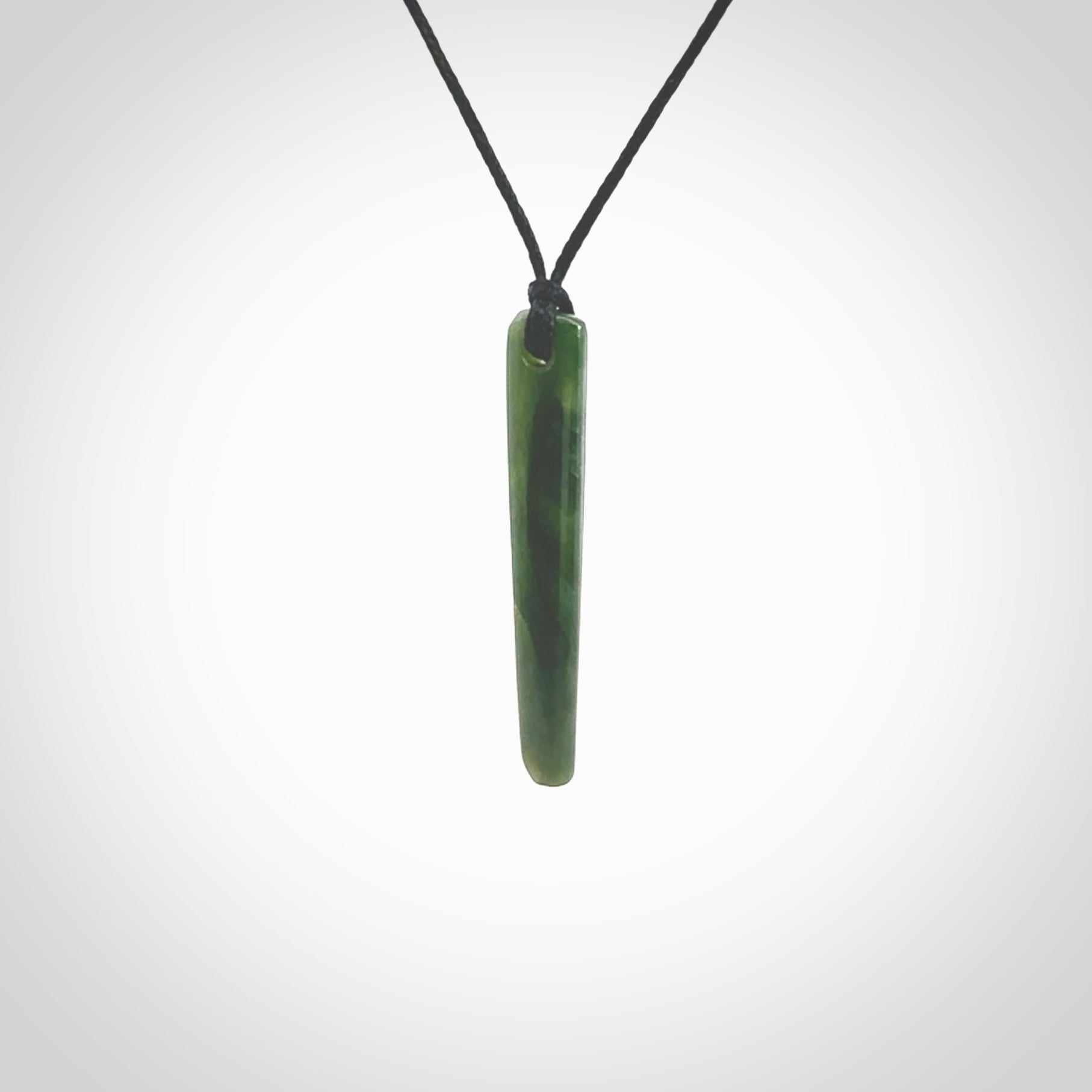 Hand carved pounamu drop pendant. Jade necklace hand made in New Zealand. A simple drop pendant carved from rare New Zealand jade. NZ Pacific jade jewellery for sale online.