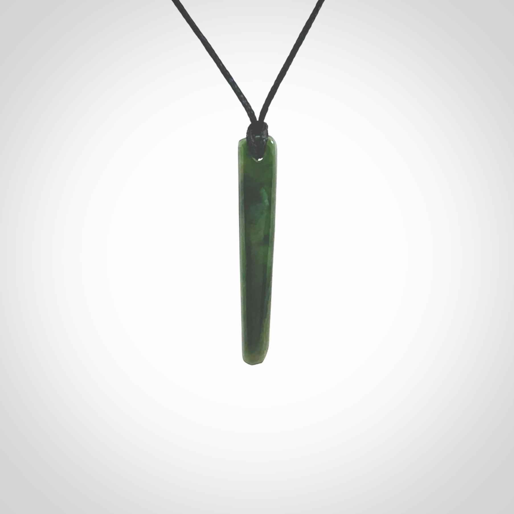 Hand carved pounamu drop pendant. Jade necklace hand made in New Zealand. A simple drop pendant carved from rare New Zealand jade. NZ Pacific jade jewellery for sale online.