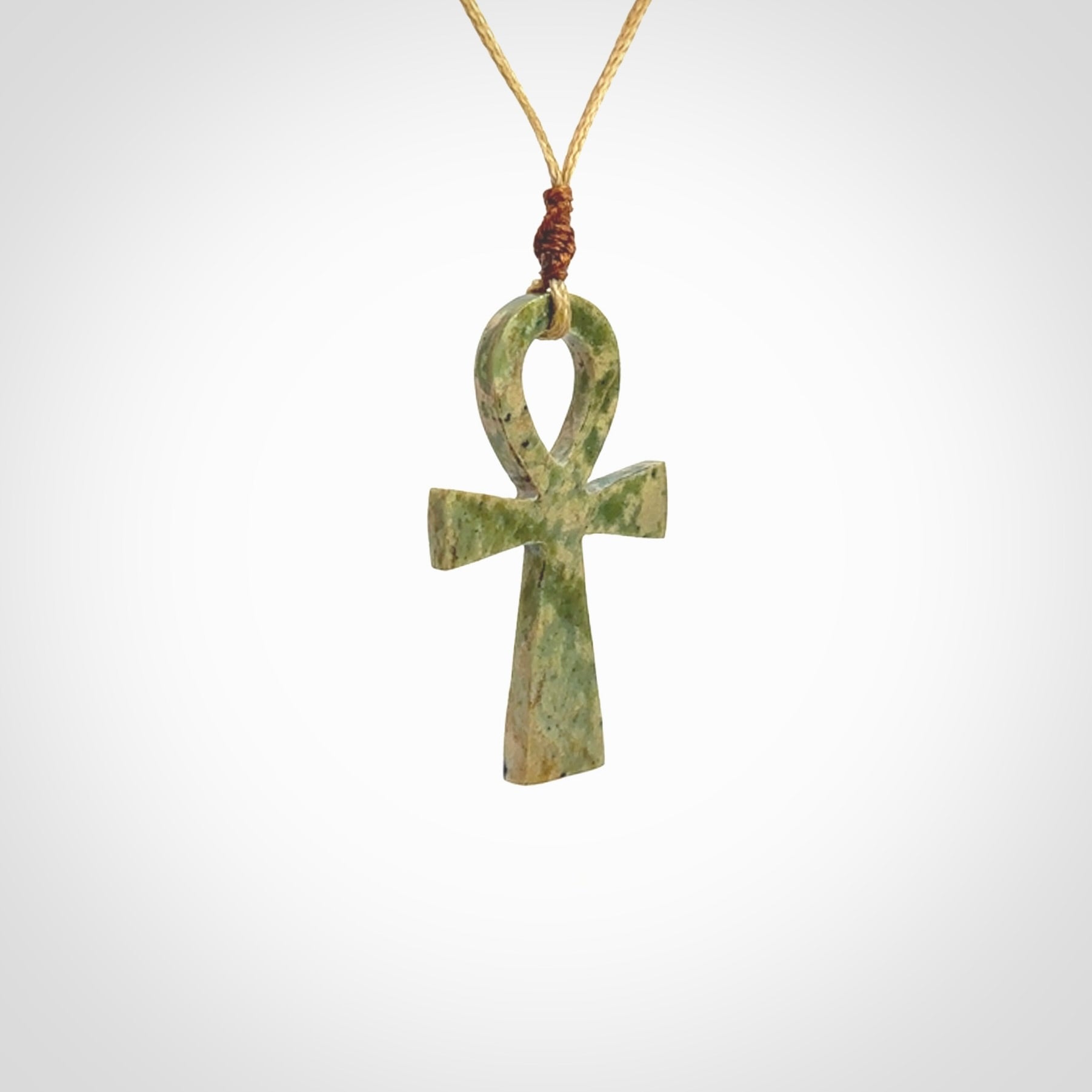 Aceh Jade Stone ankh cross pendant. Handmade jade jewellery made by NZ Pacific and for sale online. Jade stone ankh cross for men and women. Unique art to wear from NZ Pacific.