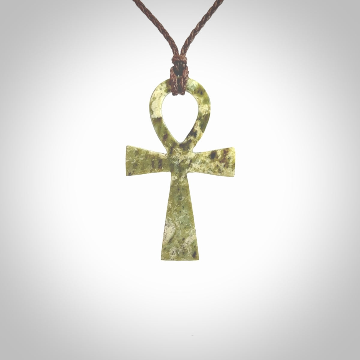 Aceh Jade Stone ankh cross pendant. Handmade jade jewellery made by NZ Pacific and for sale online. Jade stone ankh cross for men and women. Unique art to wear from NZ Pacific.