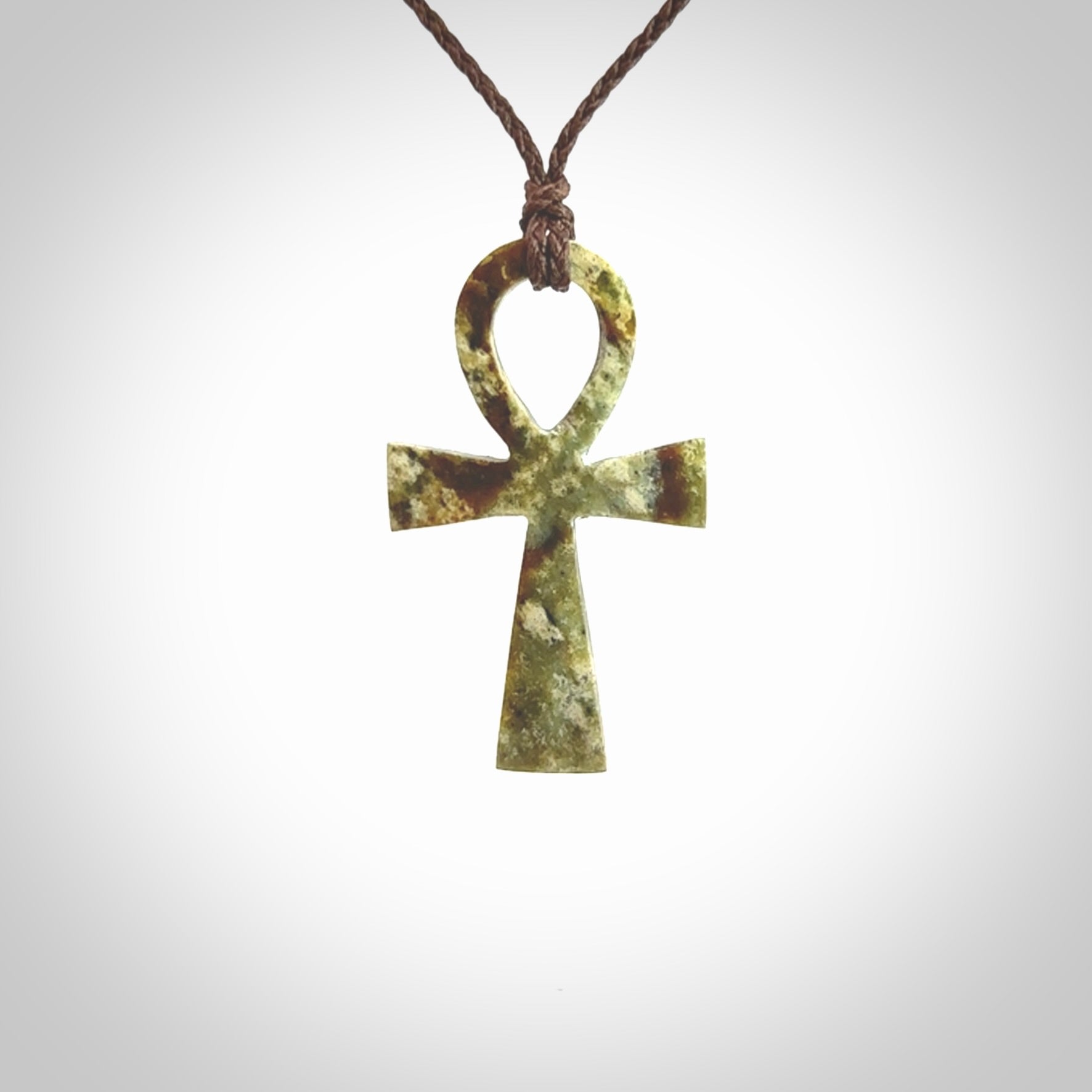 Aceh Jade Stone ankh cross pendant. Handmade jade jewellery made by NZ Pacific and for sale online. Jade stone ankh cross for men and women. Unique art to wear from NZ Pacific.