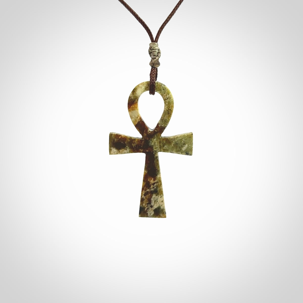 Aceh Jade Stone ankh cross pendant. Handmade jade jewellery made by NZ Pacific and for sale online. Jade stone ankh cross for men and women. Unique art to wear from NZ Pacific.