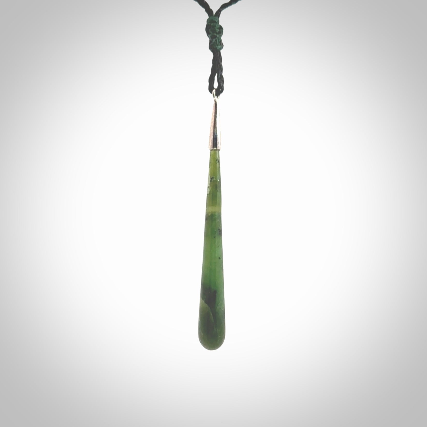 Hand made Nephrite Jade drop pendant with sterling silver cap. One only large drop pendant with adjustable black cord.