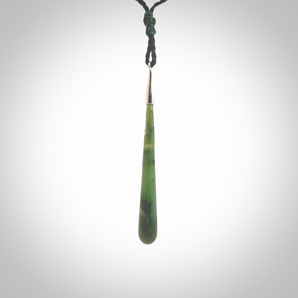 Hand made Nephrite Jade drop pendant with sterling silver cap. One only large drop pendant with adjustable black cord.