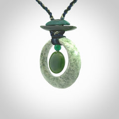 Hand carved New Zealand Jade peace bell pendant with adjustable cord. This piece is a stand out work of creativity and skill and we love Jen Hung's creations. Unique, one only, New Zealand made necklace for sale. Free shipping worldwide.