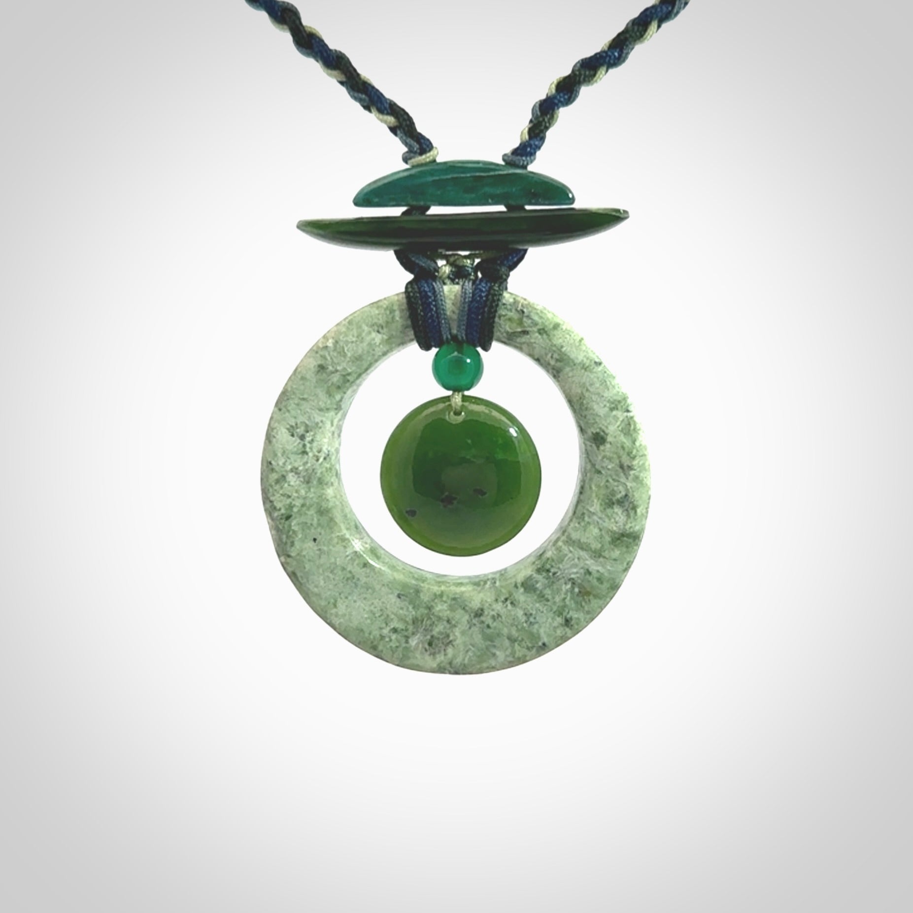 Hand carved New Zealand Jade peace bell pendant with adjustable cord. This piece is a stand out work of creativity and skill and we love Jen Hung's creations. Unique, one only, New Zealand made necklace for sale. Free shipping worldwide.