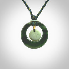 Hand carved New Zealand Jade peace bell pendant with adjustable cord. This piece is a stand out work of creativity and skill and we love Jen Hung's creations. Unique, one only, New Zealand made necklace for sale. Free shipping worldwide.