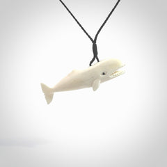 Hand carved bone contemporary sperm whale pendant. Hand carved by NZ Pacific. Free postage worldwide. Hand made whale necklace from bone. Ocean themed necklace for men and women.