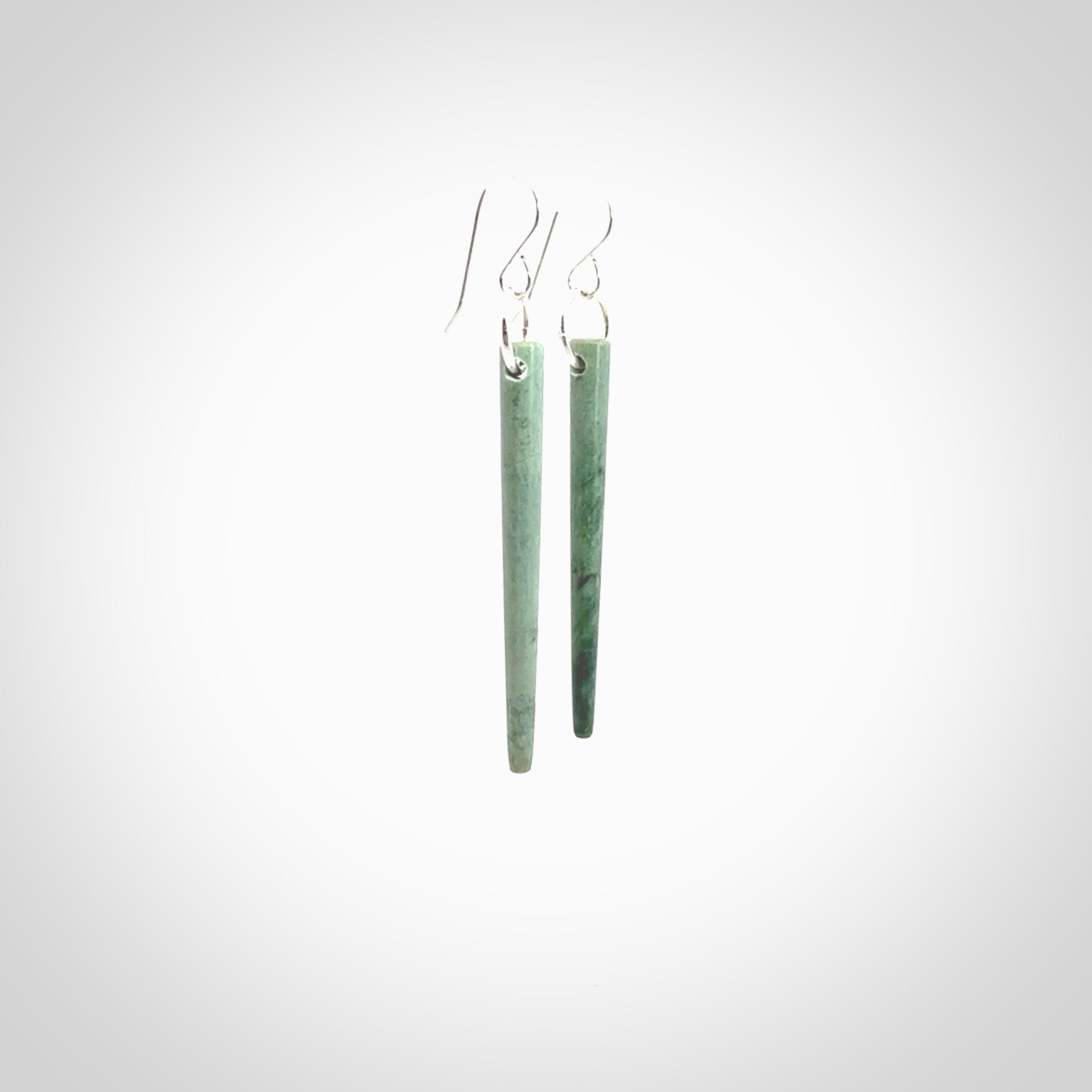 Hand crafted New Zealand Jade Inanga Jade drop earrings with Sterling Silver Hooks. Jade drop earrings, packaged in a woven kete pouch.