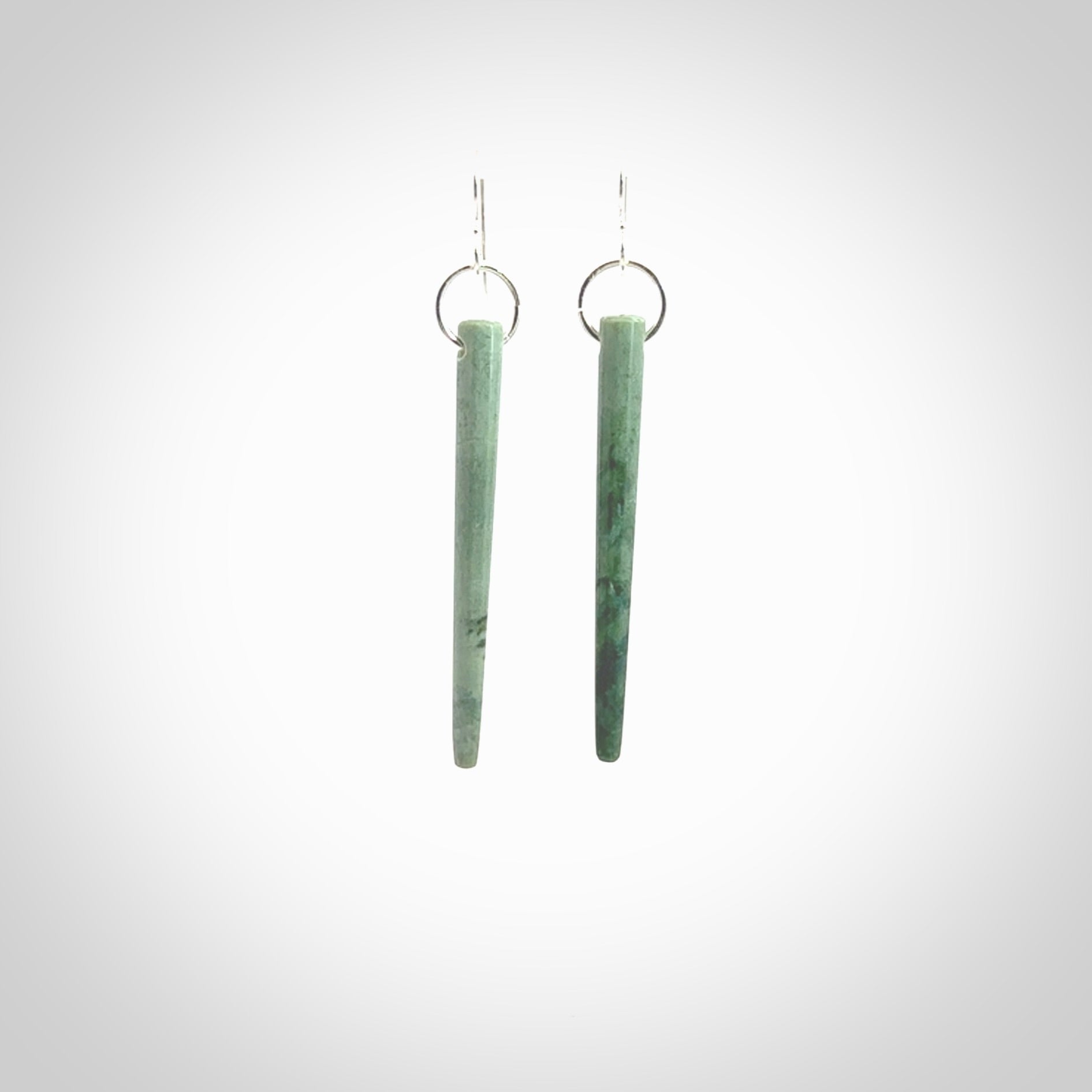 Hand crafted New Zealand Jade Inanga Jade drop earrings with Sterling Silver Hooks. Jade drop earrings, packaged in a woven kete pouch.