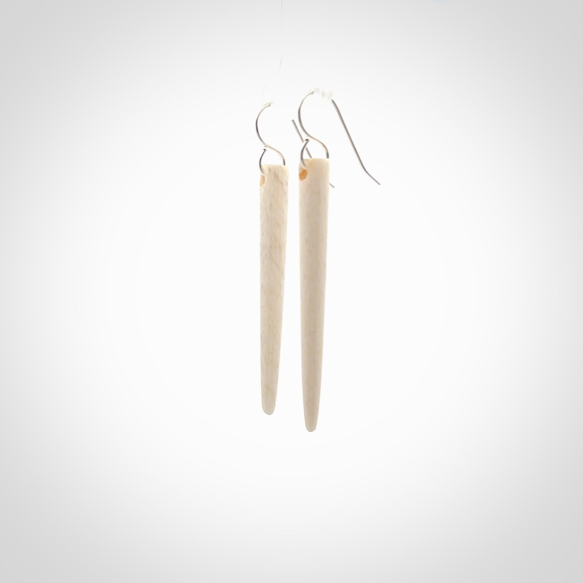 Hand carved large whalebone drop earrings hand made by Kristal Thompson. One only large whale bone drop earrings. Real whale bone art to wear. Free Shipping worldwide. One pair only, delivered in a kete pouch.