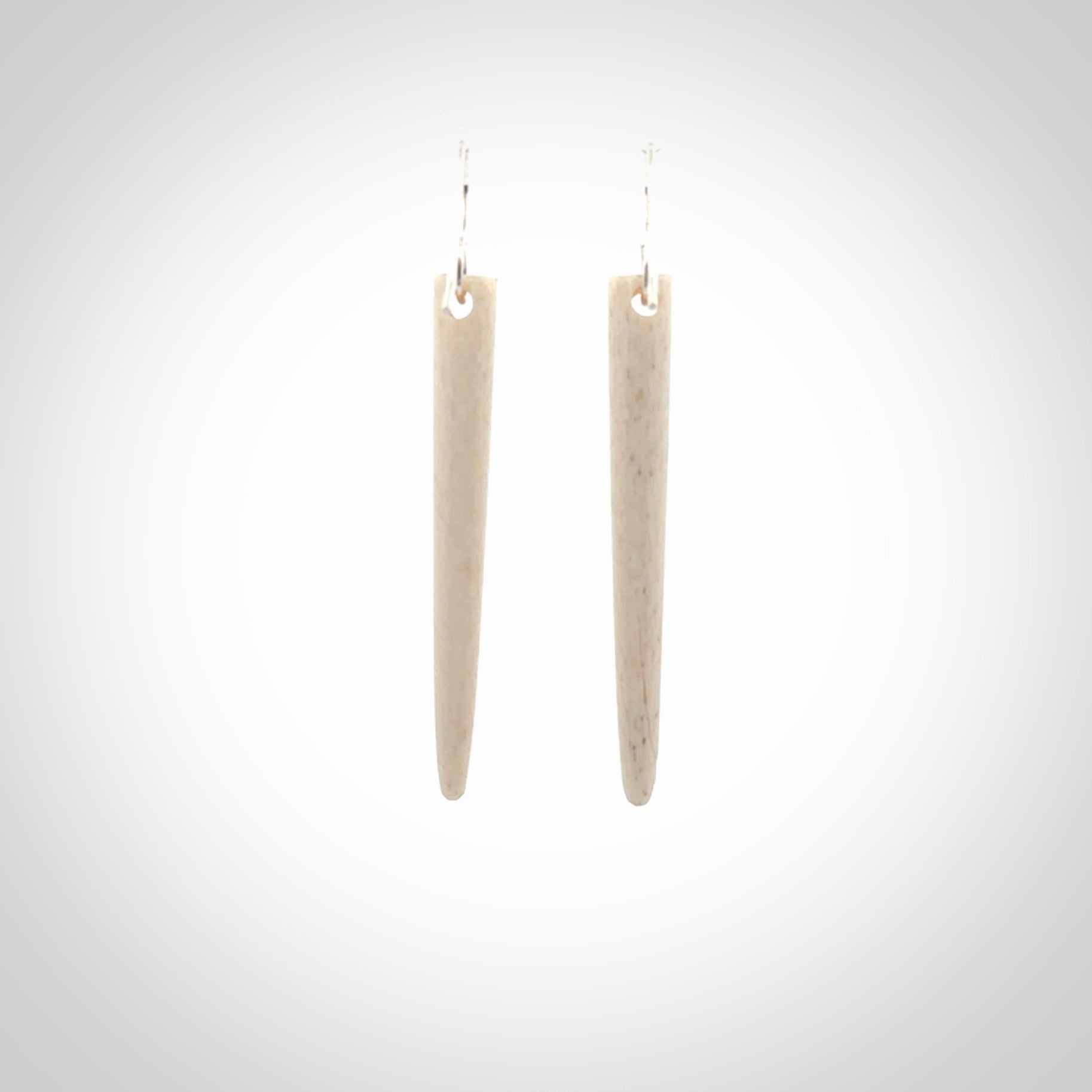 Hand carved large whalebone drop earrings hand made by Kristal Thompson. One only large whale bone drop earrings. Real whale bone art to wear. Free Shipping worldwide. One pair only, delivered in a kete pouch.