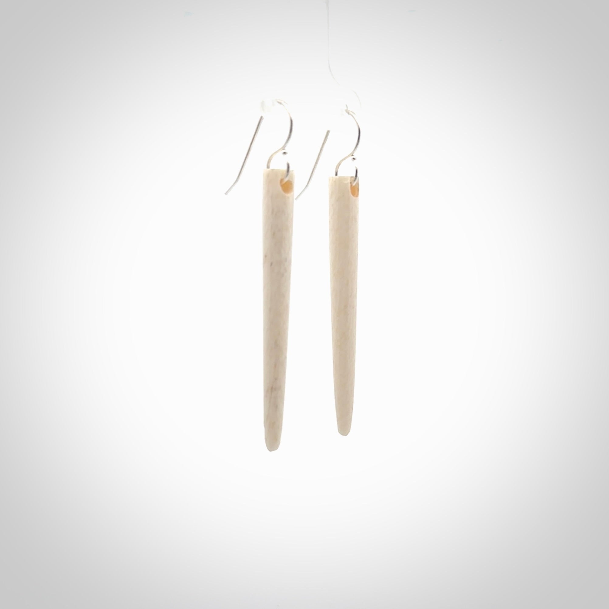 Hand carved large whalebone drop earrings hand made by Kristal Thompson. One only large whale bone drop earrings. Real whale bone art to wear. Free Shipping worldwide. One pair only, delivered in a kete pouch.