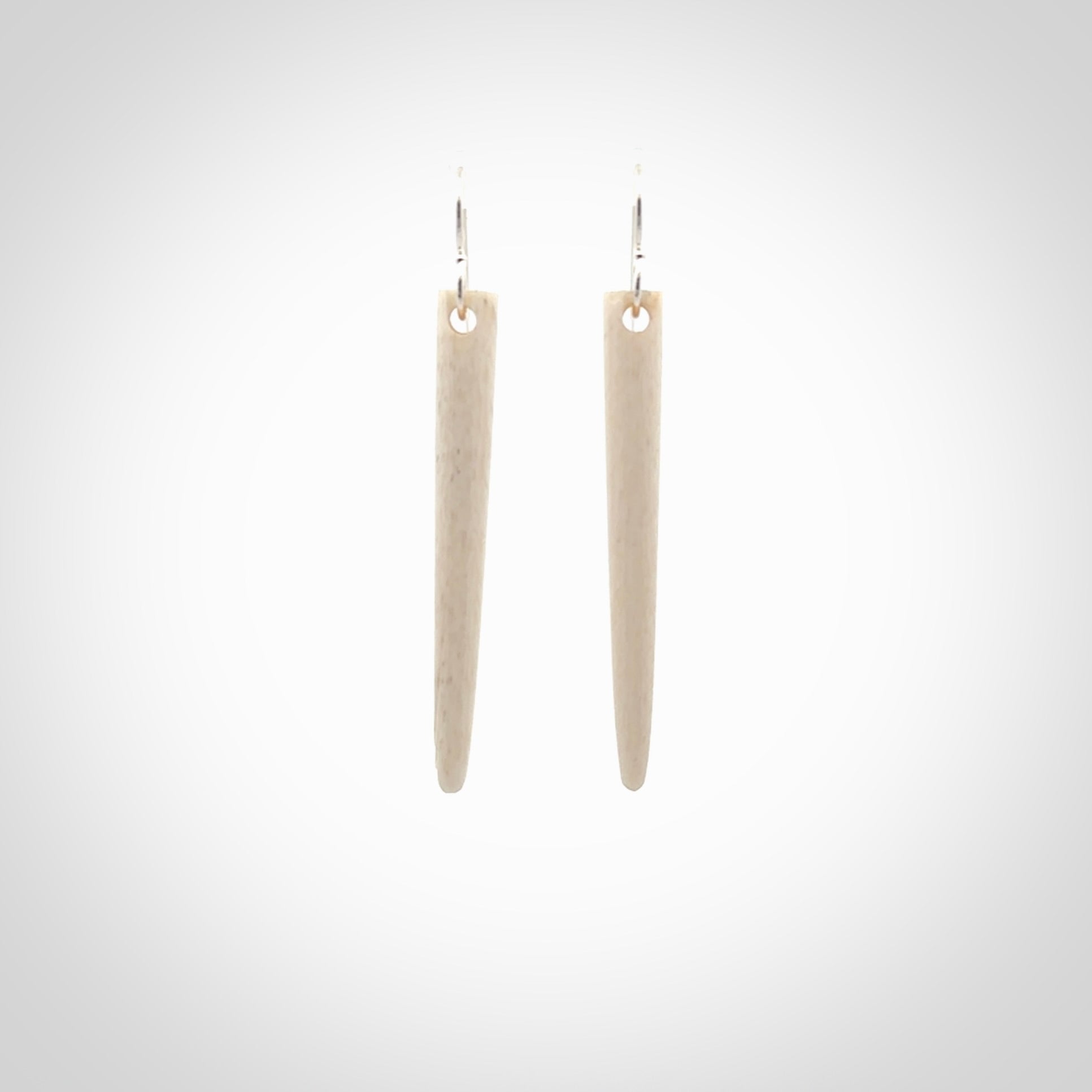 Hand carved large whalebone drop earrings hand made by Kristal Thompson. One only large whale bone drop earrings. Real whale bone art to wear. Free Shipping worldwide. One pair only, delivered in a kete pouch.