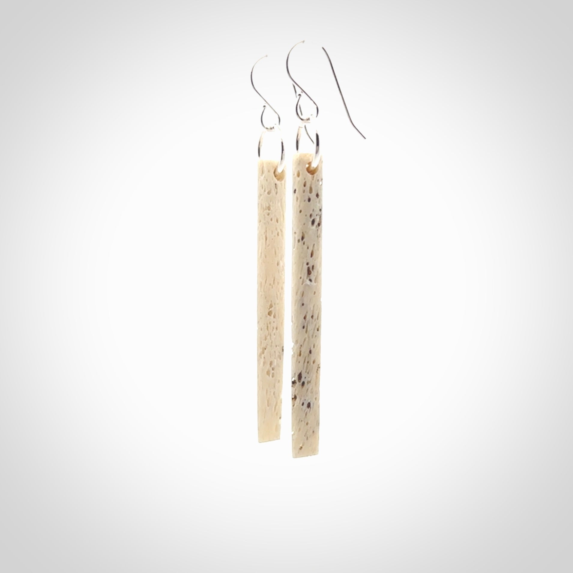 Hand carved large whalebone drop earrings hand made by Kristal Thompson. One only large whale bone drop earrings. Real whale bone art to wear. Free Shipping worldwide. One pair only, delivered in a kete pouch.