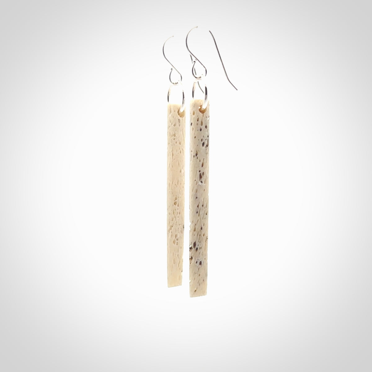 Hand carved large whalebone drop earrings hand made by Kristal Thompson. One only large whale bone drop earrings. Real whale bone art to wear. Free Shipping worldwide. One pair only, delivered in a kete pouch.