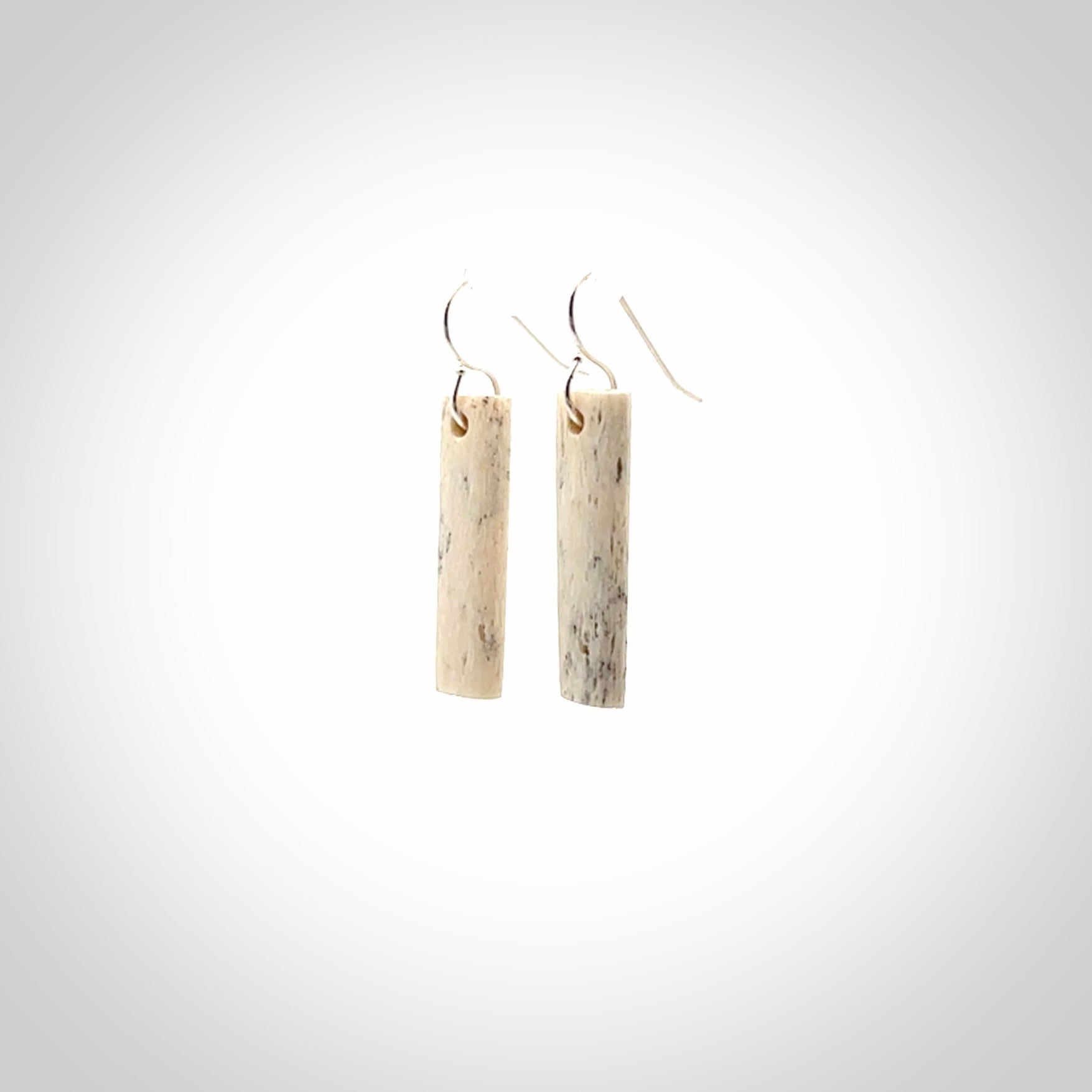 Hand carved medium whalebone drop earrings hand made by Kristal Thompson. One only large whale bone drop earrings. Real whale bone art to wear. Free Shipping worldwide. One pair only, delivered in a kete pouch.