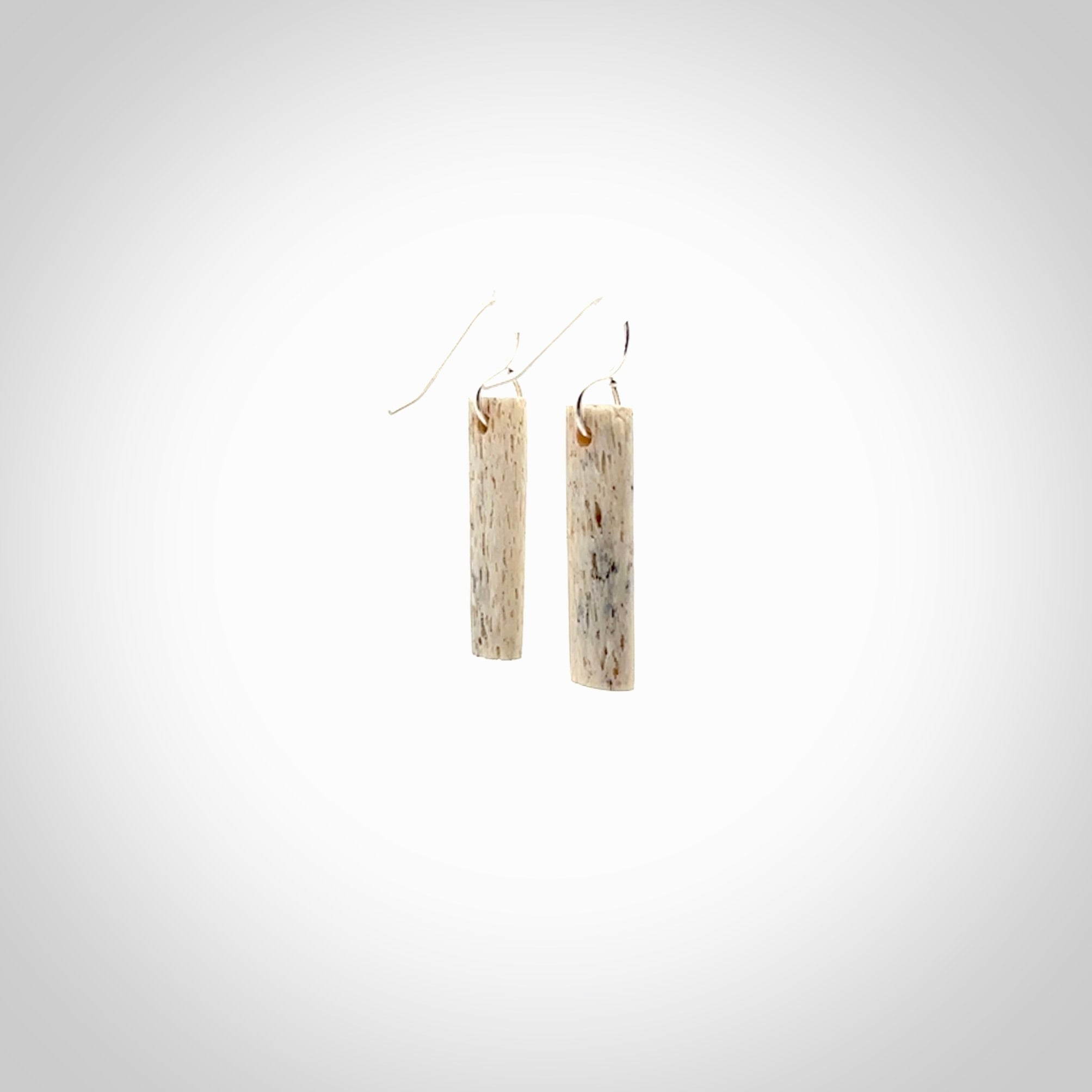 Hand carved medium whalebone drop earrings hand made by Kristal Thompson. One only large whale bone drop earrings. Real whale bone art to wear. Free Shipping worldwide. One pair only, delivered in a kete pouch.