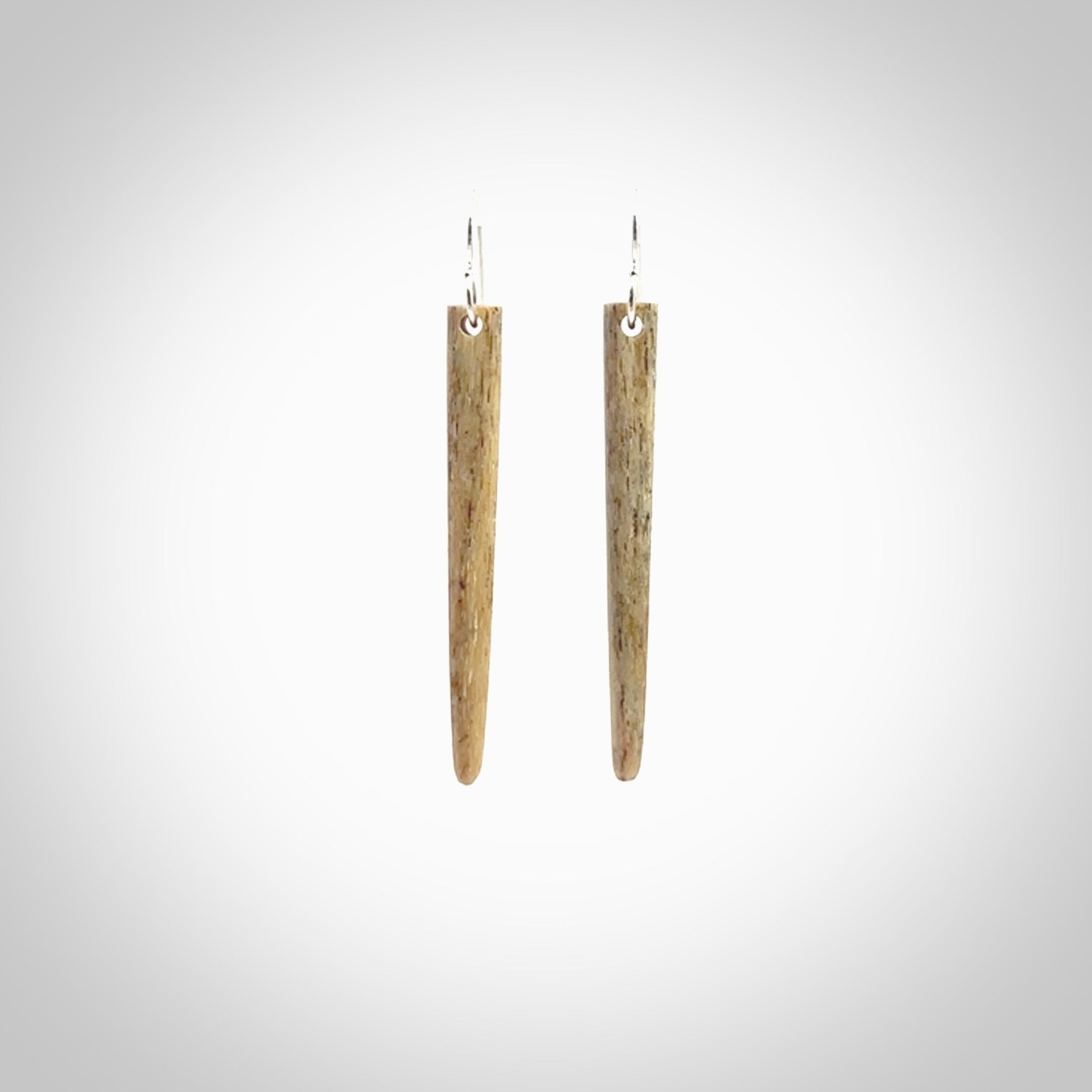 Hand carved whalebone drop earrings hand made by Kristal Thompson. One only large whale bone drop earrings. Real whale bone art to wear. Free Shipping worldwide. One pair only, delivered in a kete pouch.