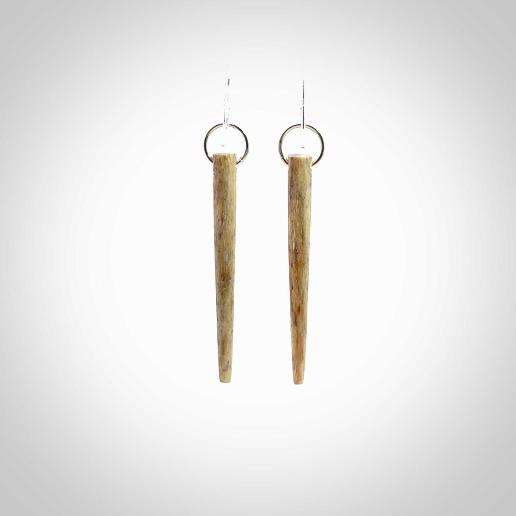 Hand carved whalebone drop earrings hand made by Kristal Thompson. One only large whale bone drop earrings. Real whale bone art to wear. Free Shipping worldwide. One pair only, delivered in a kete pouch.