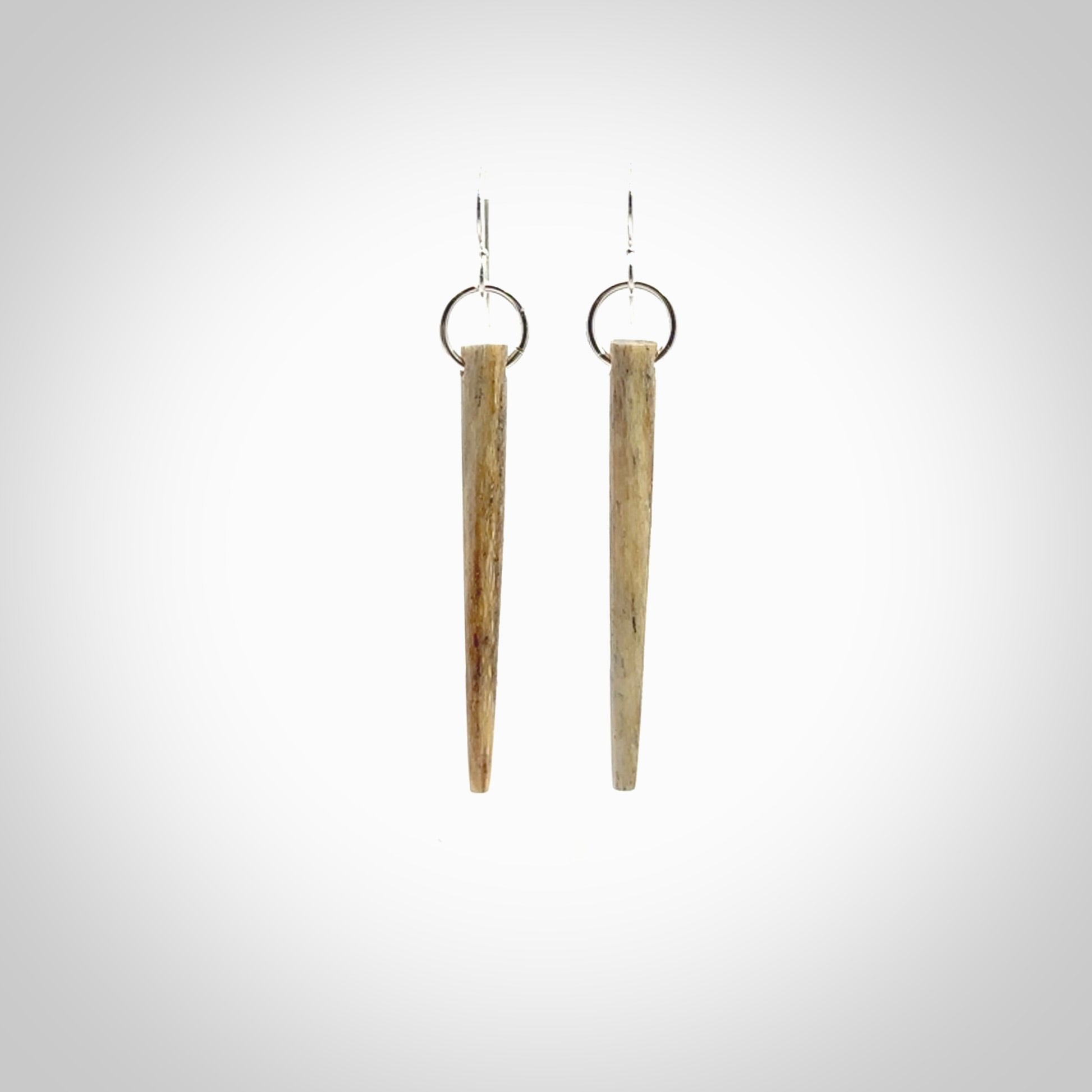 Hand carved whalebone drop earrings hand made by Kristal Thompson. One only large whale bone drop earrings. Real whale bone art to wear. Free Shipping worldwide. One pair only, delivered in a kete pouch.