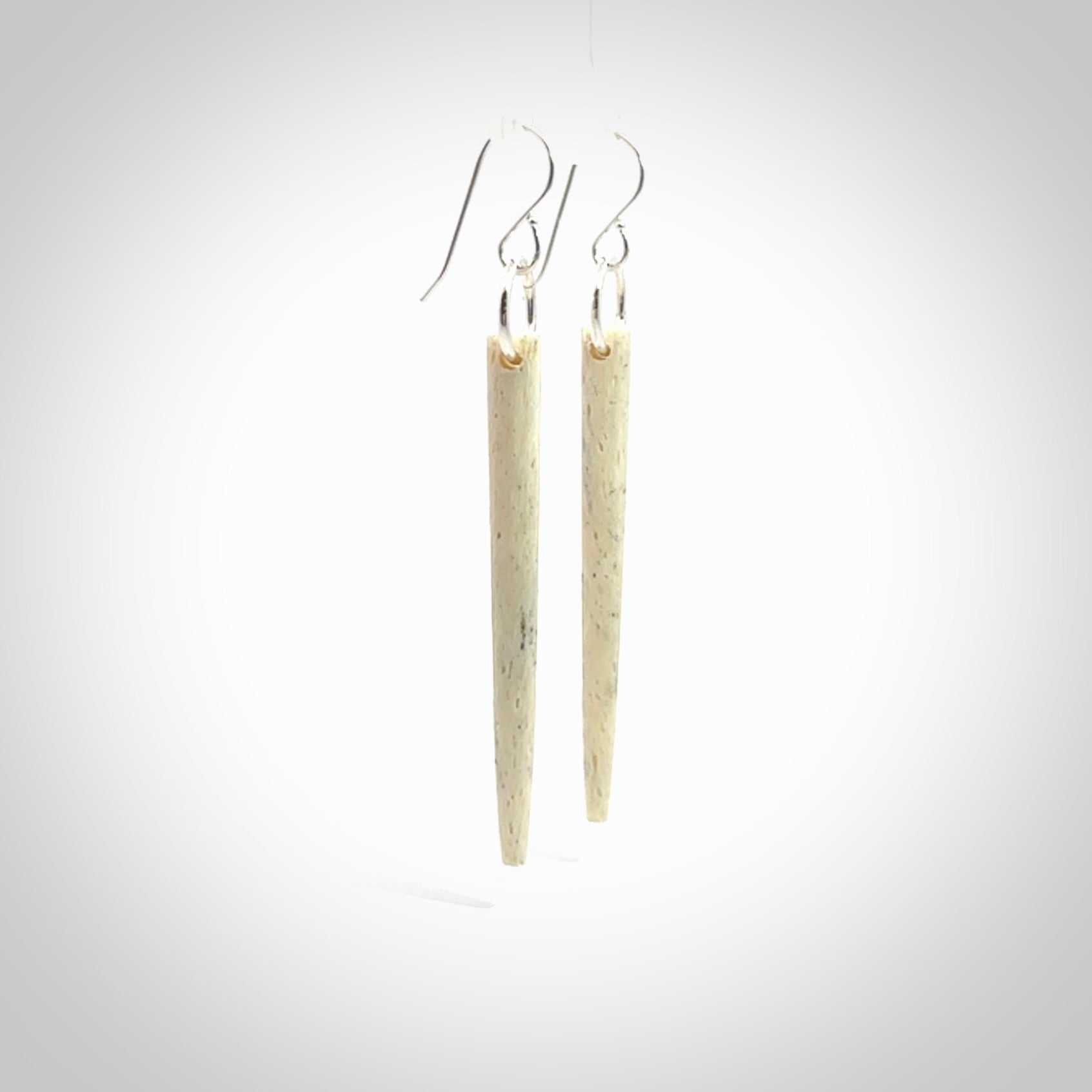 Hand carved large whalebone drop earrings hand made by Kristal Thompson. One only large whale bone drop earrings. Real whale bone art to wear. Free Shipping worldwide. One pair only, delivered in a kete pouch.