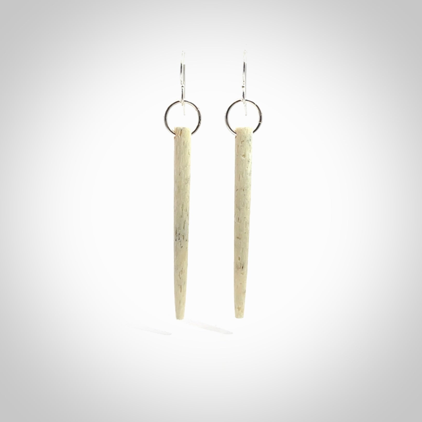 Hand carved large whalebone drop earrings hand made by Kristal Thompson. One only large whale bone drop earrings. Real whale bone art to wear. Free Shipping worldwide. One pair only, delivered in a kete pouch.