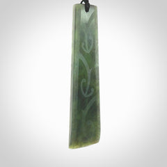 Hand made large New Zealand jade toki with koru pendant. Hand carved in New Zealand by Kerry Thompson. Hand made jewellery. Unique large Jade Toki with black cord. Free shipping worldwide.