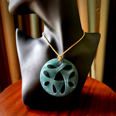 This large piece is a hand carved complex twist pendant. Kerry carved this from Guatemalan Jade. It is a gorgeous blue colour and is an artistic piece of jewellery. Hand made by Kerry Thompson and delivered to you in a kete pouch.