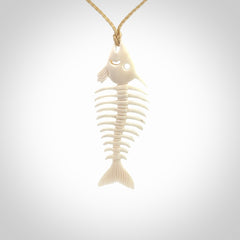 Hand carved bone fish skeleton pendant. Hand made bone fish necklace. Fish themed jewellery. Ocean themed pendant. One only necklace provided with adjustable cord and free delivery.