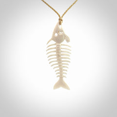 Hand carved bone fish skeleton pendant. Hand made bone fish necklace. Fish themed jewellery. Ocean themed pendant. One only necklace provided with adjustable cord and free delivery.