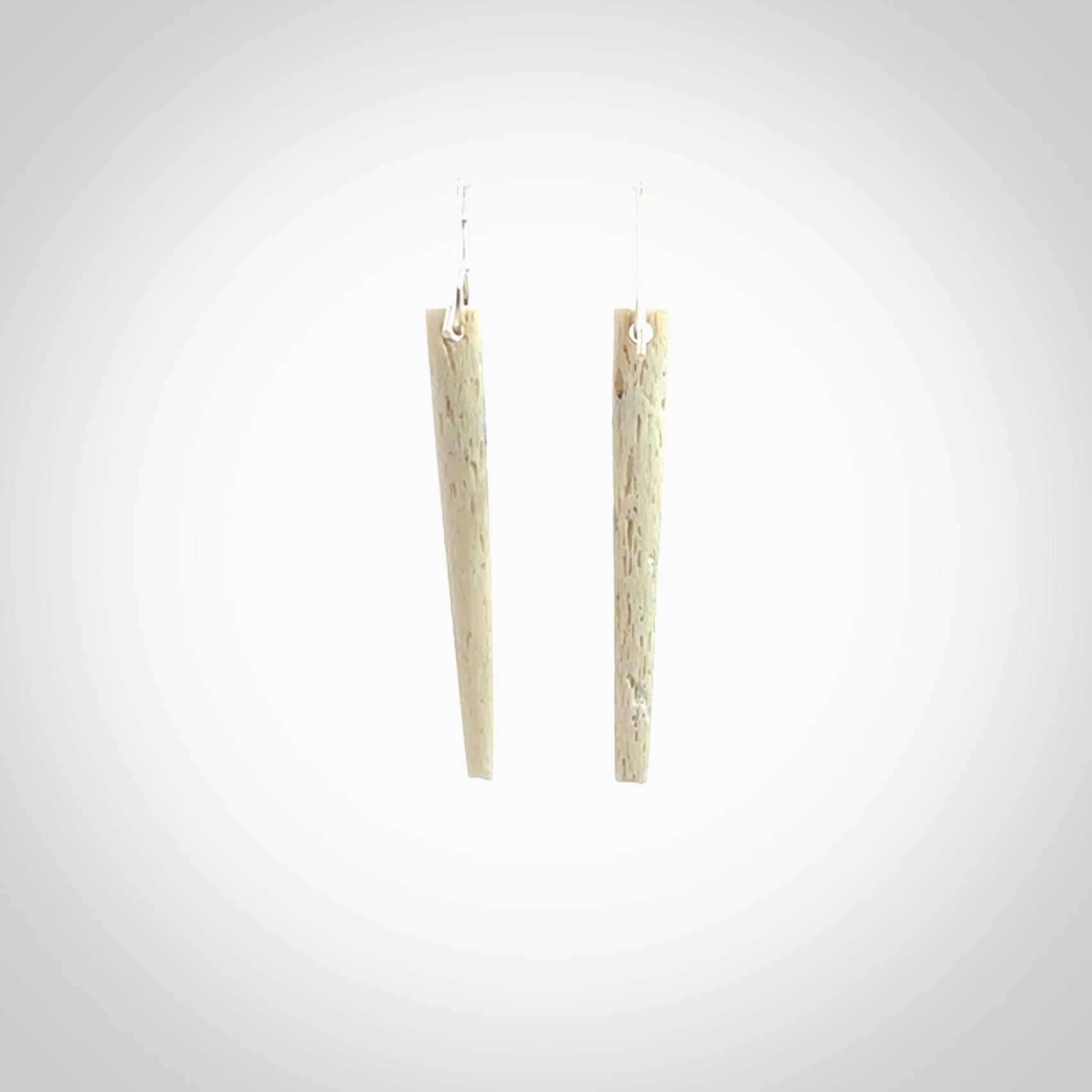 Hand carved medium whalebone drop earrings hand made by Kristal Thompson. One only large whale bone drop earrings. Real whale bone art to wear. Free Shipping worldwide. One pair only, delivered in a kete pouch.