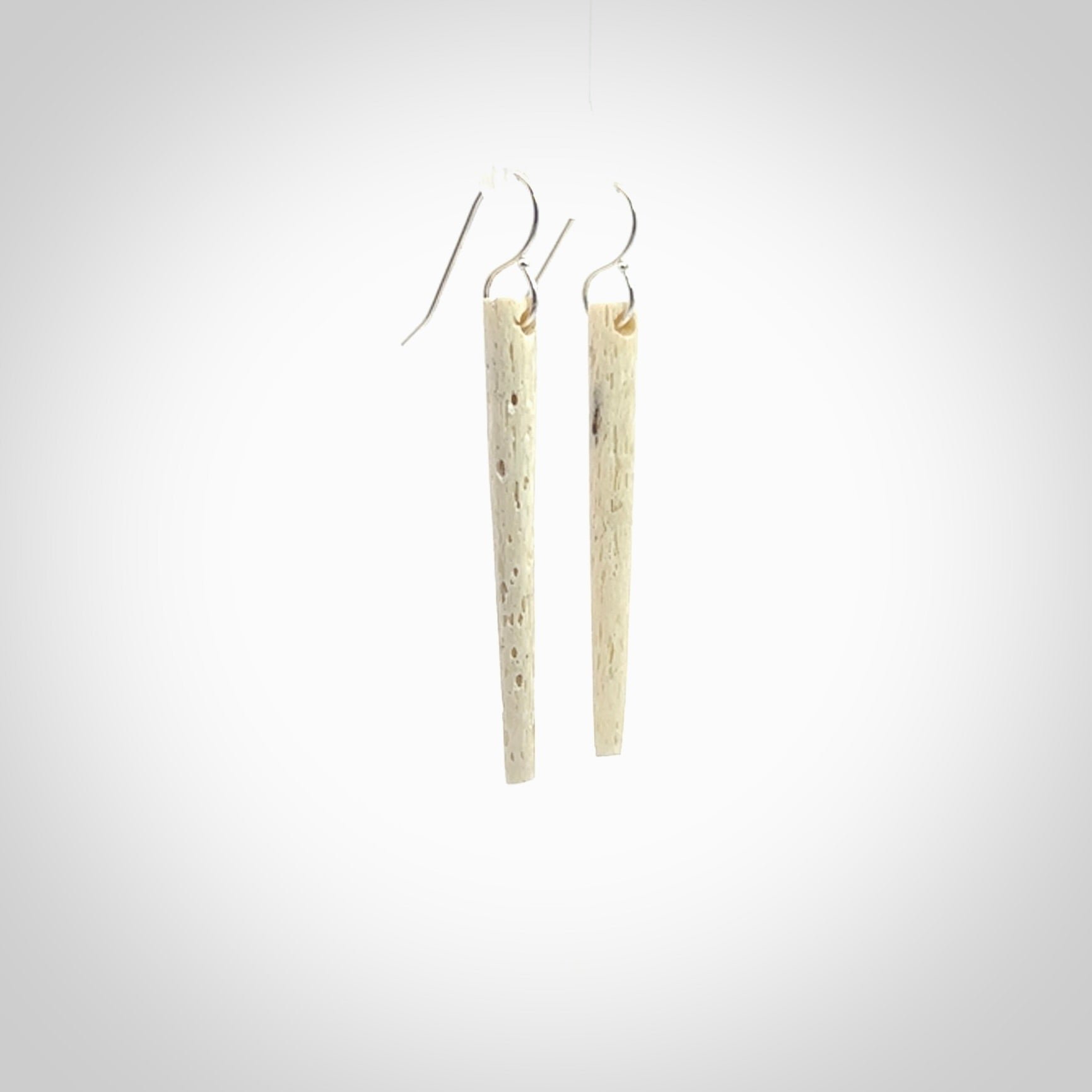 Hand carved medium whalebone drop earrings hand made by Kristal Thompson. One only large whale bone drop earrings. Real whale bone art to wear. Free Shipping worldwide. One pair only, delivered in a kete pouch.