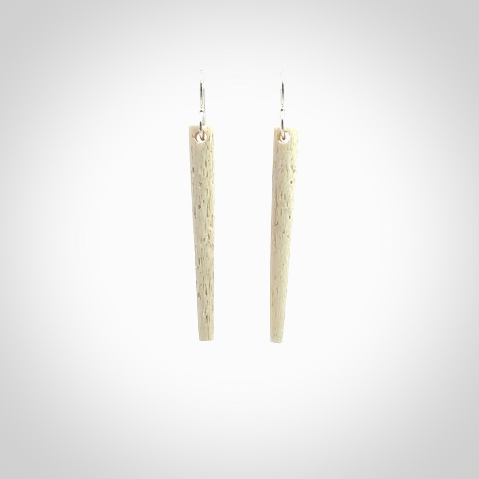 Hand carved medium whalebone drop earrings hand made by Kristal Thompson. One only large whale bone drop earrings. Real whale bone art to wear. Free Shipping worldwide. One pair only, delivered in a kete pouch.