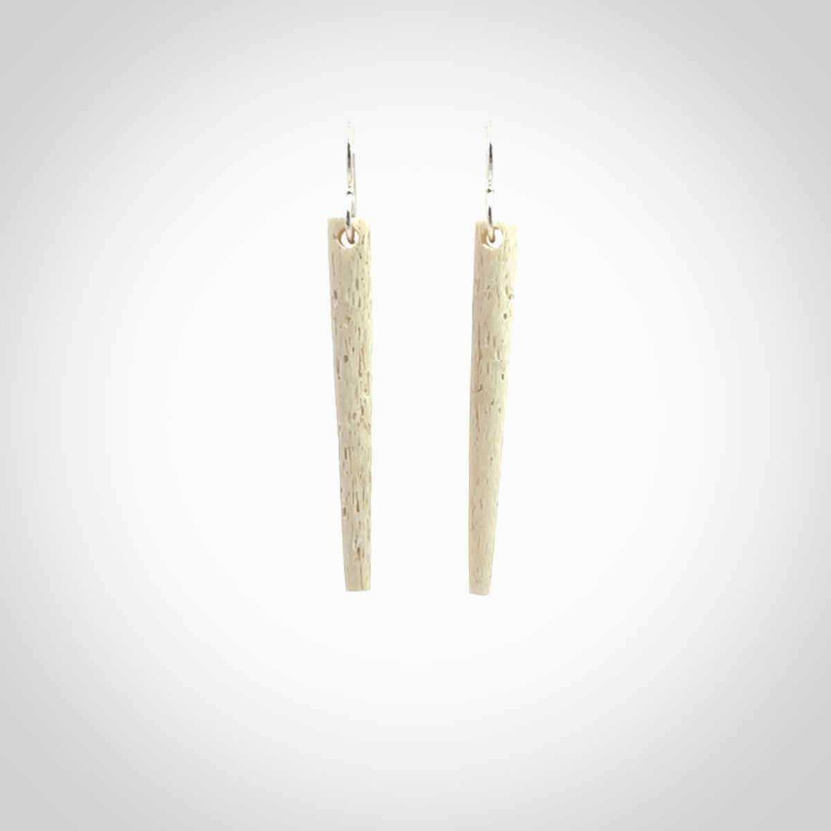 Hand carved medium whalebone drop earrings hand made by Kristal Thompson. One only large whale bone drop earrings. Real whale bone art to wear. Free Shipping worldwide. One pair only, delivered in a kete pouch.