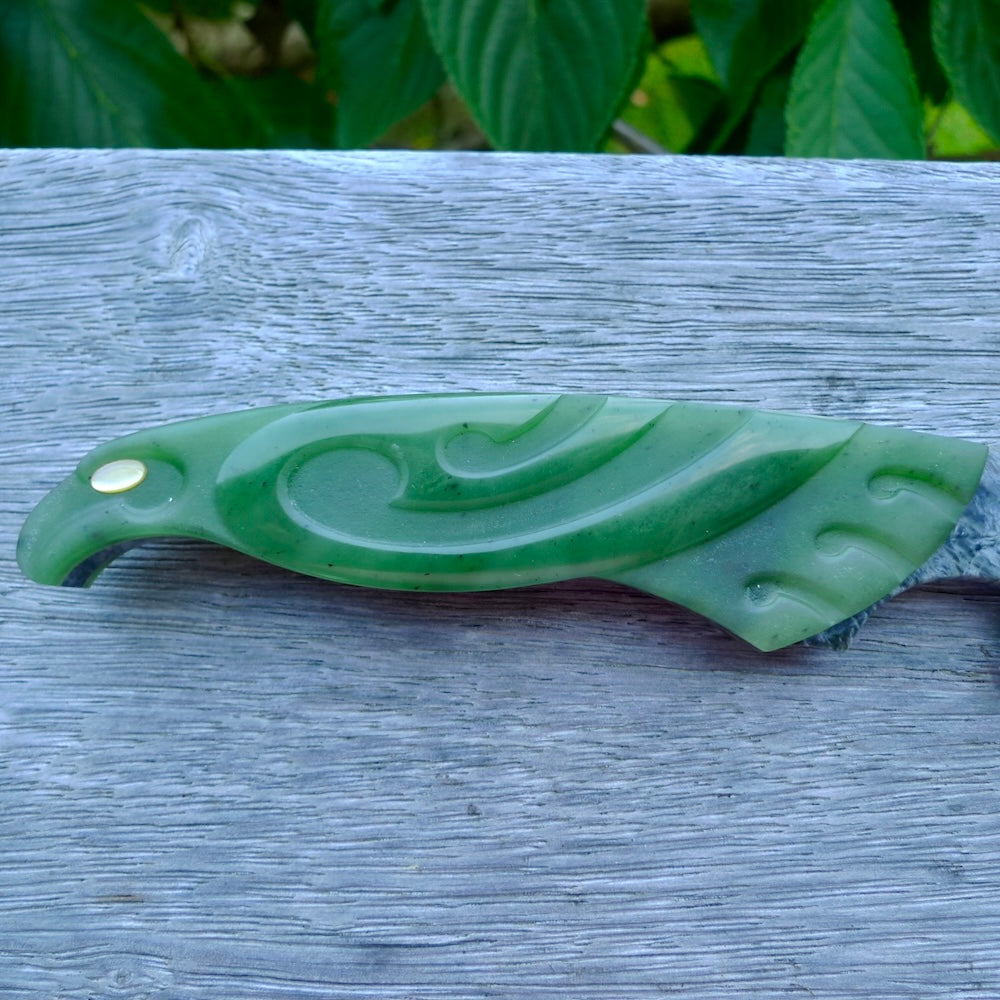 A hand carved large New Zealand Jade Haast Eagle knife display art. A large sized hand made Jade Haast eagle knife by New Zealand artist Kerry Thompson. One off work of art to display.