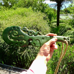 Hand carved wahaika Pounamu. Art to display. One only hand made wahaika display piece with base. New Zealand wahaika carved in Pounamu, Jade by Kerry Thompson. Free delivery worldwide.