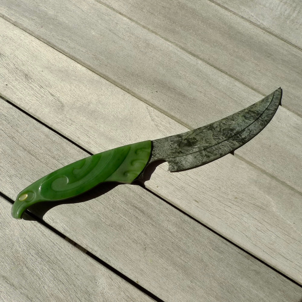 A hand carved large New Zealand Jade Haast Eagle knife display art. A large sized hand made Jade Haast eagle knife by New Zealand artist Kerry Thompson. One off work of art to display.