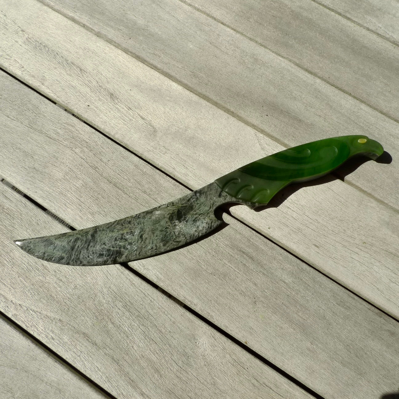 A hand carved large New Zealand Jade Haast Eagle knife display art. A large sized hand made Jade Haast eagle knife by New Zealand artist Kerry Thompson. One off work of art to display.