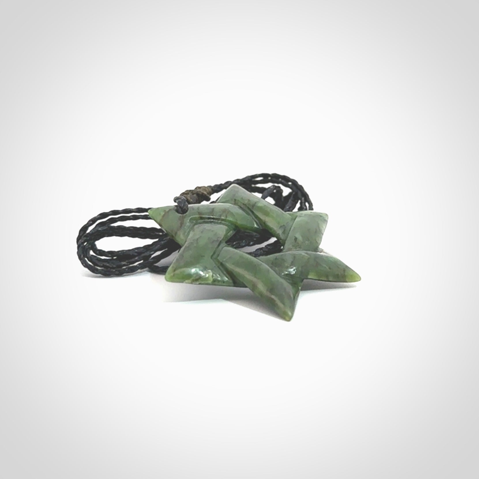 Star of David pendant hand carved from New Zealand Green Jade. Made by NZ Pacific and for sale worldwide. Postage is included in the price.