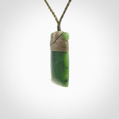 Hand carved jade toki pendant. Carved by NZ Pacific in green jade. Hand made Jade Toki necklace for men and women. Beautiful greenstone Toki with adjustable cord. Delivered to you with Express Courier.