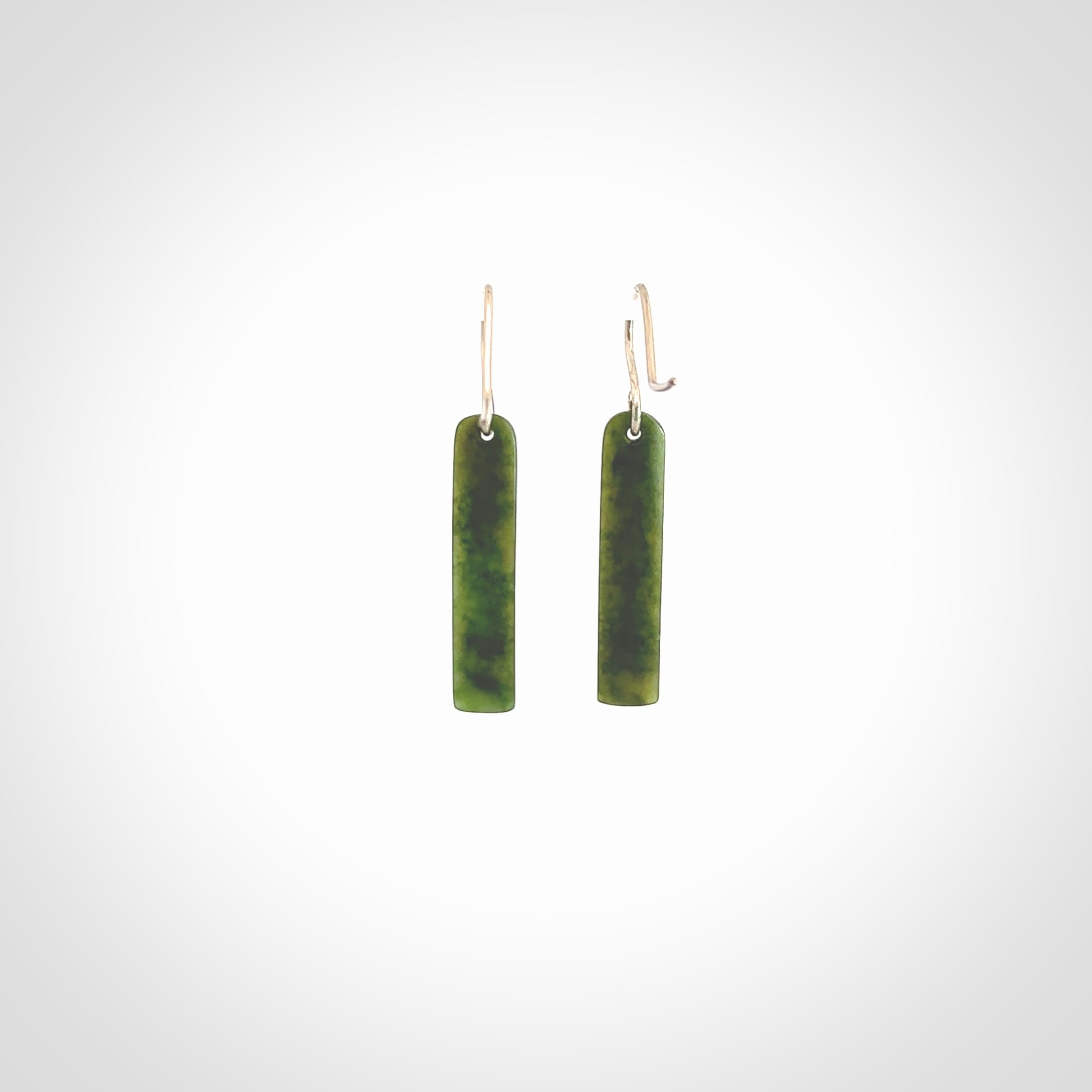 Hand carved medium sized New Zealand jade drop earrings. Made by NZ Pacific from real jade. Online jewellery for sale online by NZ Pacific. Medium sized Jade drop earrings hand carved by New Zealand carver Ric Moor.