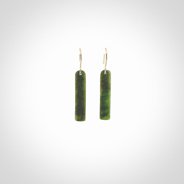 Hand carved medium sized New Zealand jade drop earrings. Made by NZ Pacific from real jade. Online jewellery for sale online by NZ Pacific. Medium sized Jade drop earrings hand carved by New Zealand carver Ric Moor.