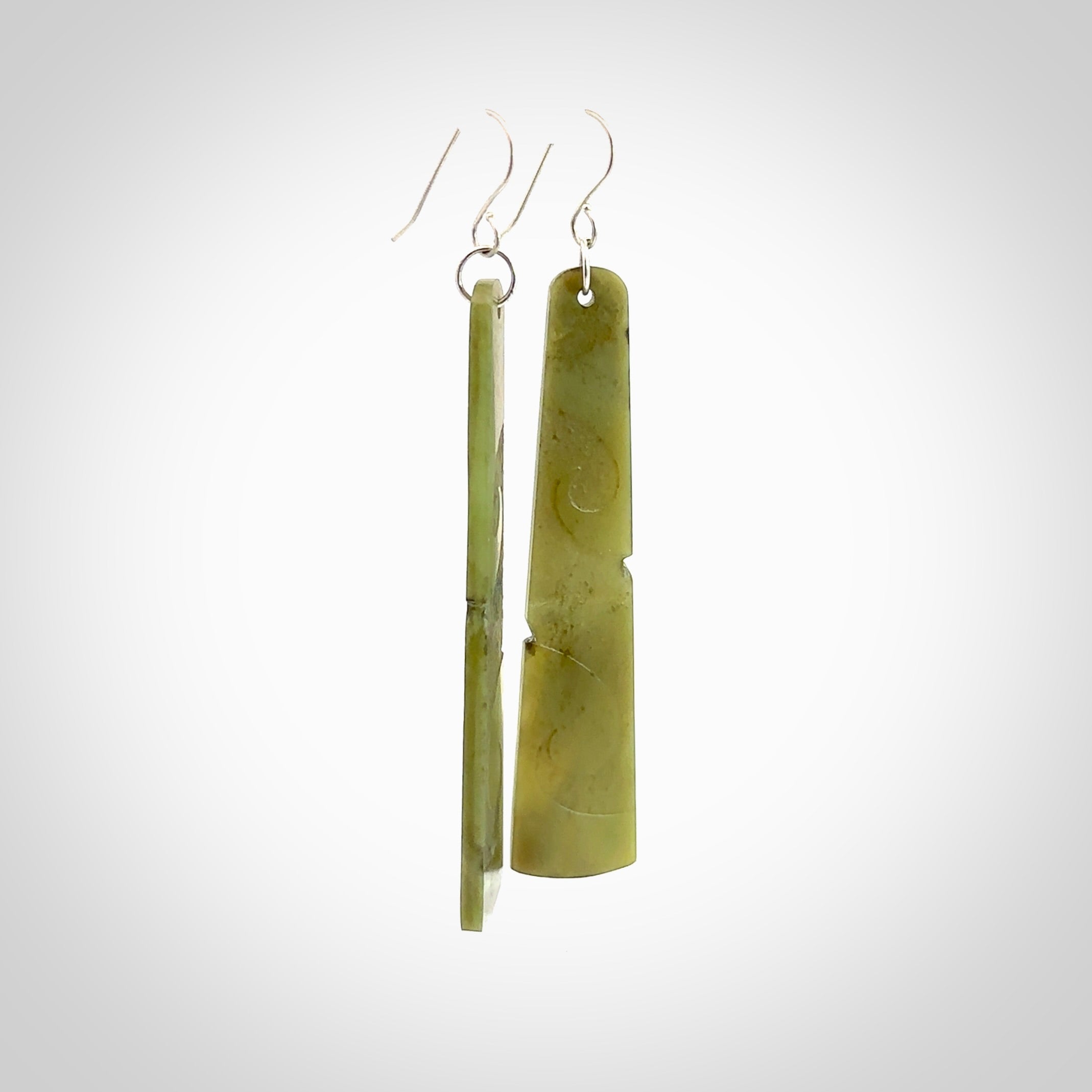 Hand carved by Rueben Tipene, these lovely koru jade earrings are hand made and an absolute delight. One pair only, postage is included in the price.